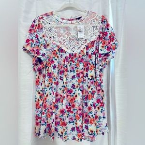 Torrid size 1 which is 14/15 floral